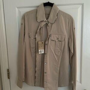 Beautiful button up Burberry women’s top in the color, pale trench.